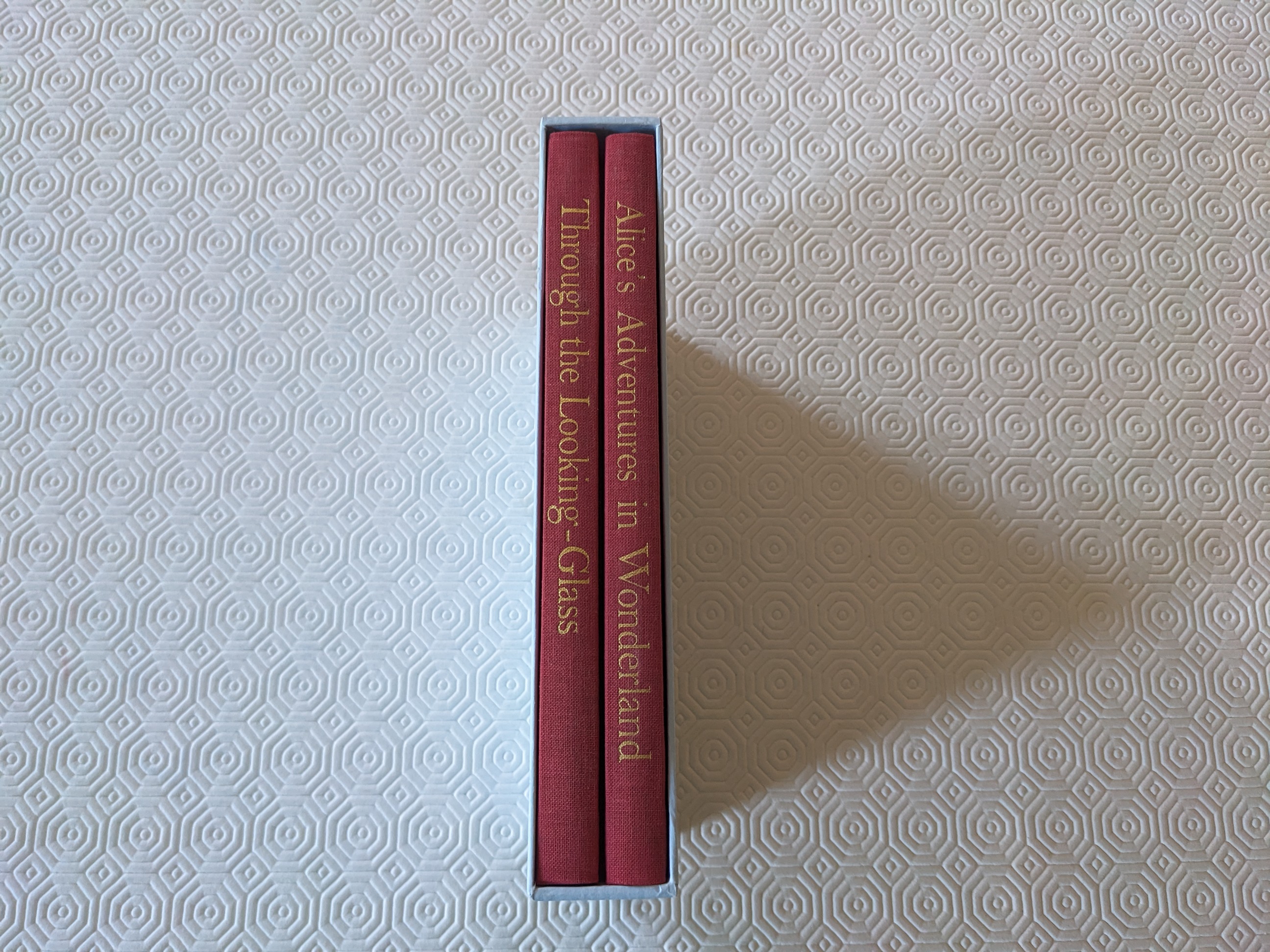 Alice in Wonderland and Alice Through the Looking Glass